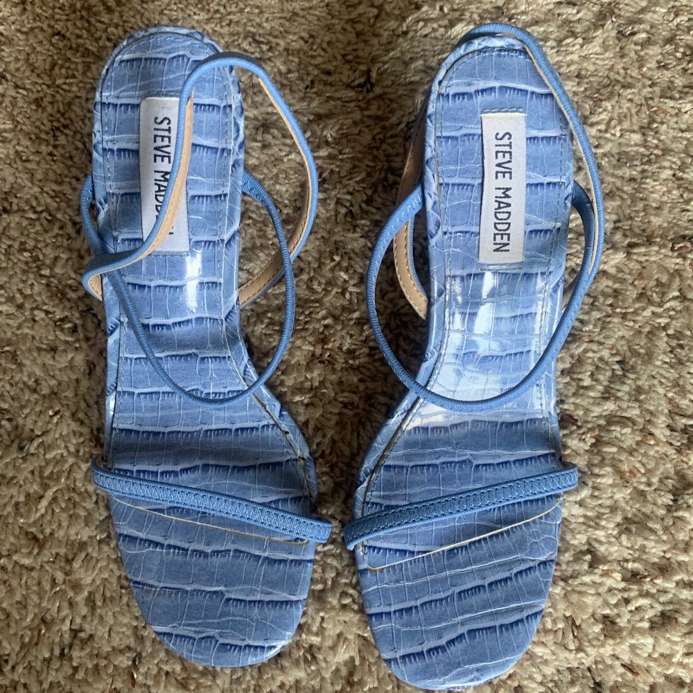 Blue Heels  Strappy with elastic straps  Blue croc embossed leather  Brand: Stev